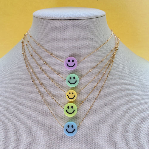 Smiley face gold chain necklace